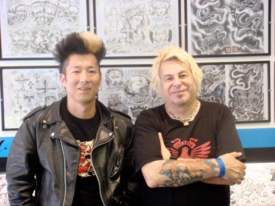 Jet & Charlie at Skunx Tattoo shop, London, 2008. Click on the photo to visit their website.